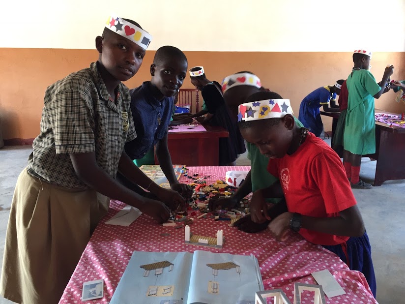 kassunga students working on a school project